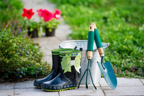 Gardeners wearing protective equipment on site